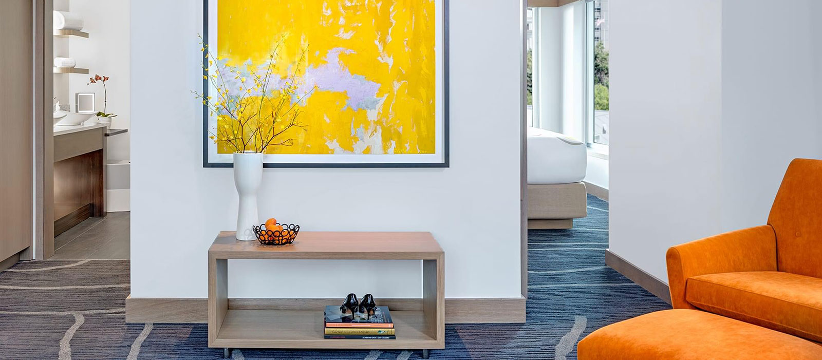 Custom commercial wood millwork feature wall with warm lighting