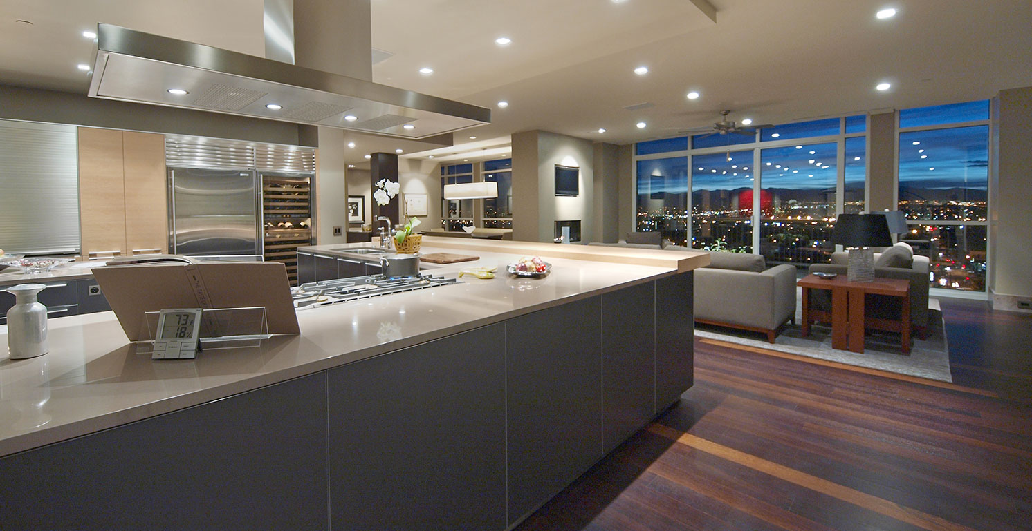 Luxury condo interior with custom millwork cabinetry and wood detailing